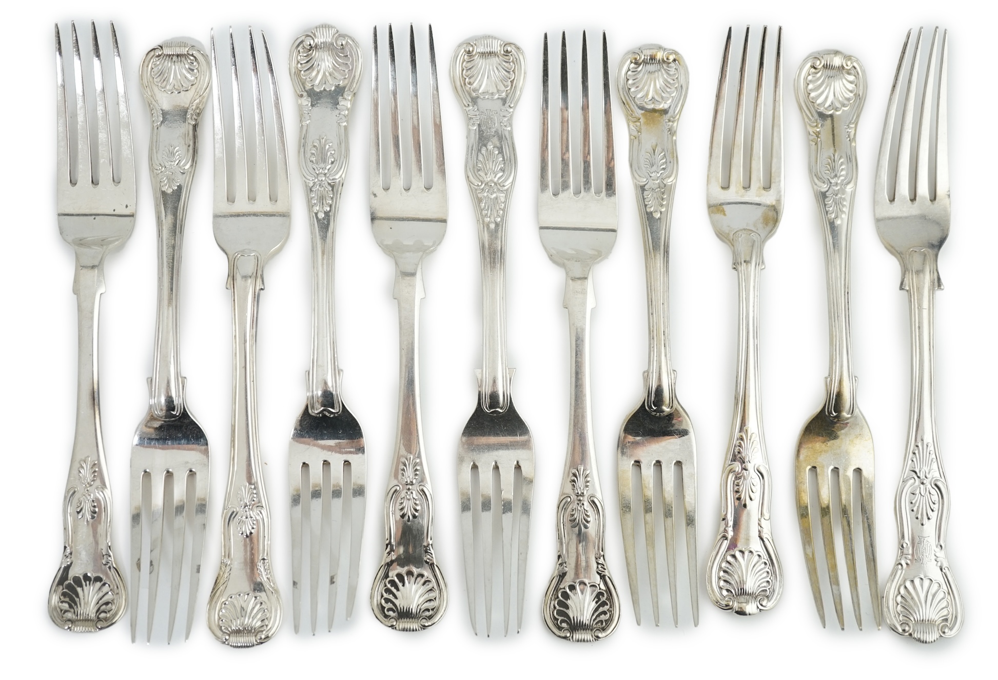 A harlequin set of eleven Georgian and Victorian silver Kings pattern table forks, various dates and makers, 32.8ozs.